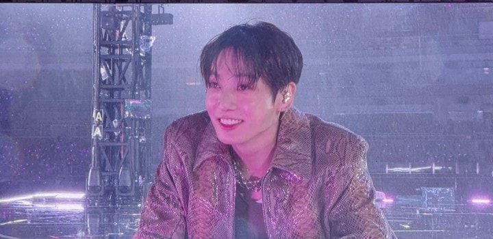 BTS performing in the rain during their tour (photo 4 of 4)