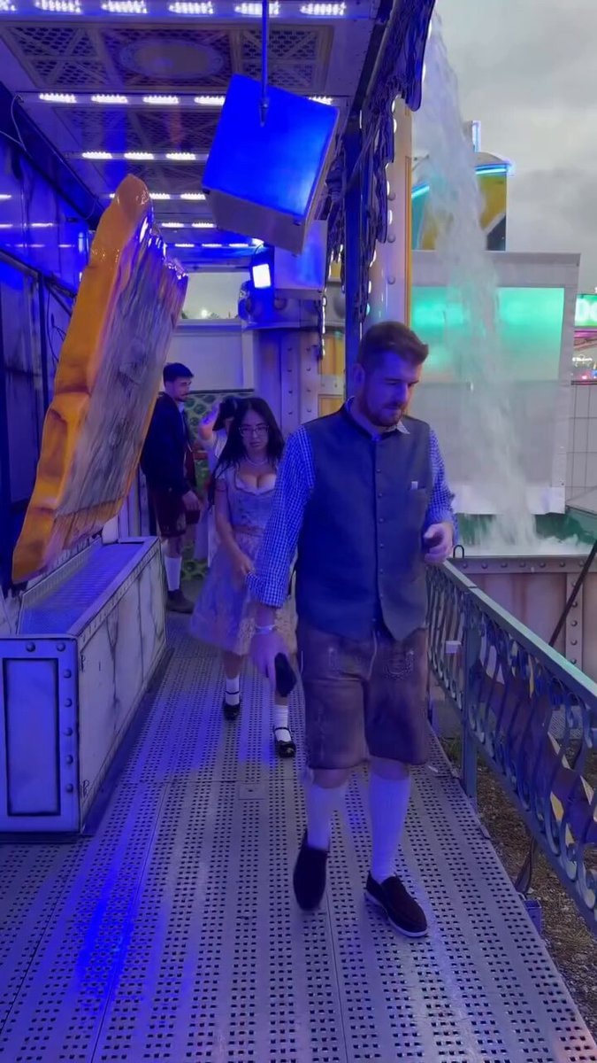 Bavarian attire on amusement park ride