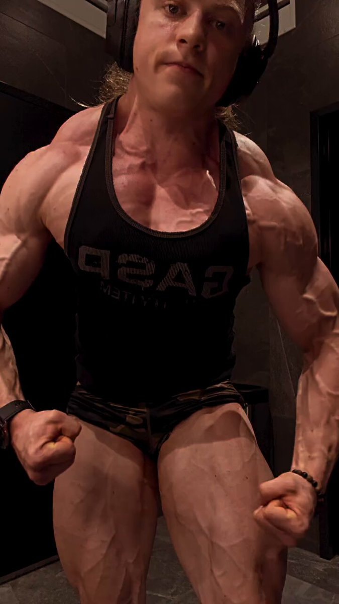 bodybuilder posing to show physique