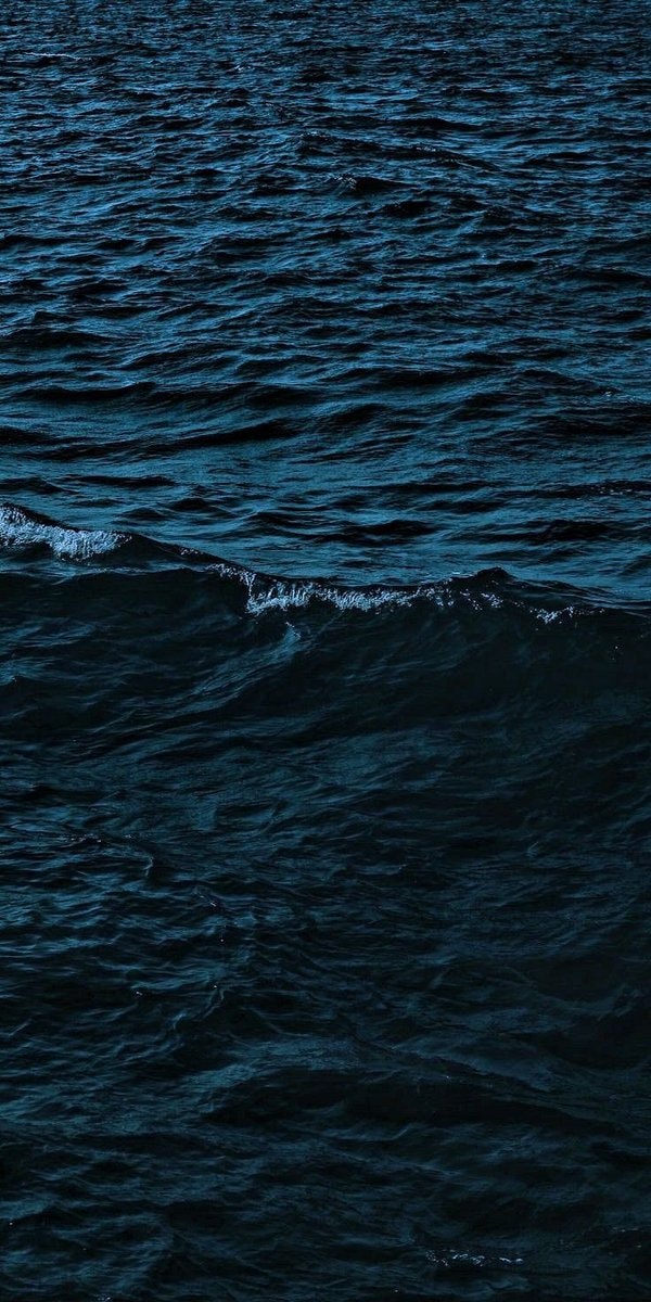 Sailboat lost in blue water (photo 2 of 4)