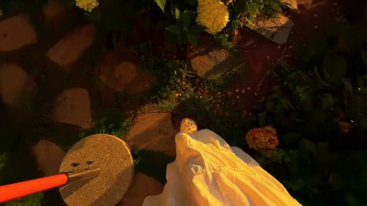 yellow dress and Crocs on stone path