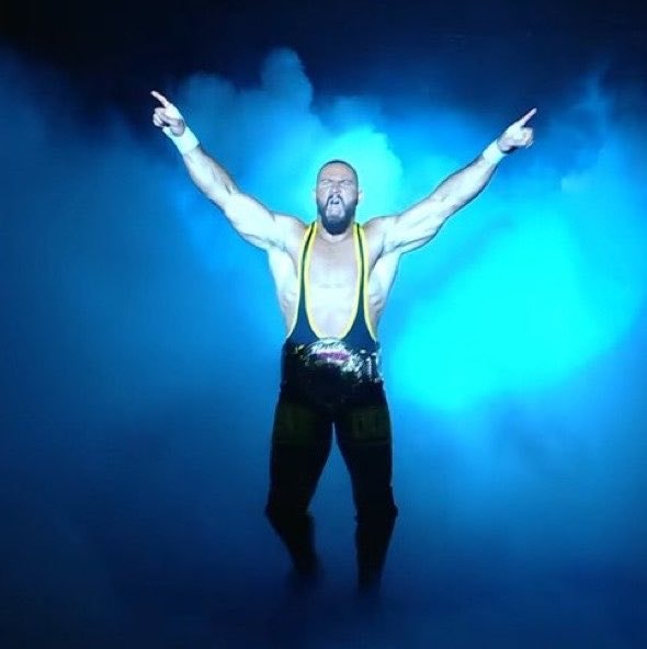 Wrestler emerging from blue smoke