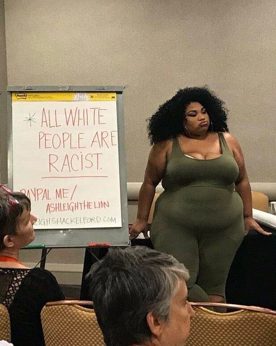 Whiteboard message woman green outfit