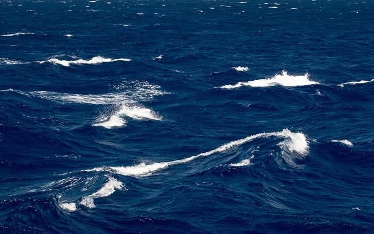 choppy deep blue ocean (photo 1 of 4)