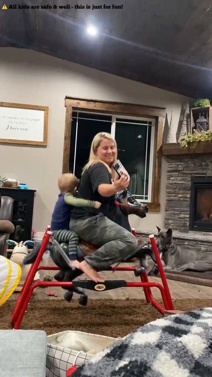 Parents try toy horse ride Parents try toy horse ride