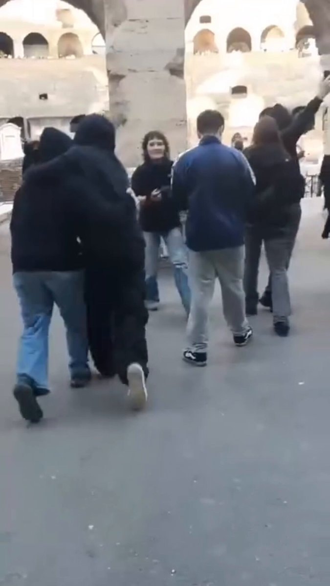Colosseum Rome masked rioters