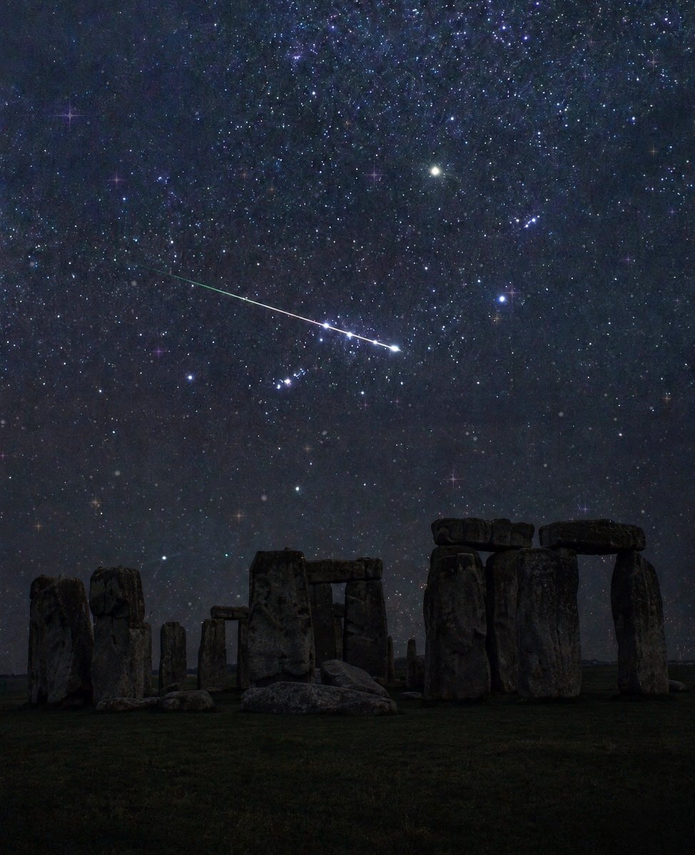 Meteor slicing across Orion's Belt above Stonehenge