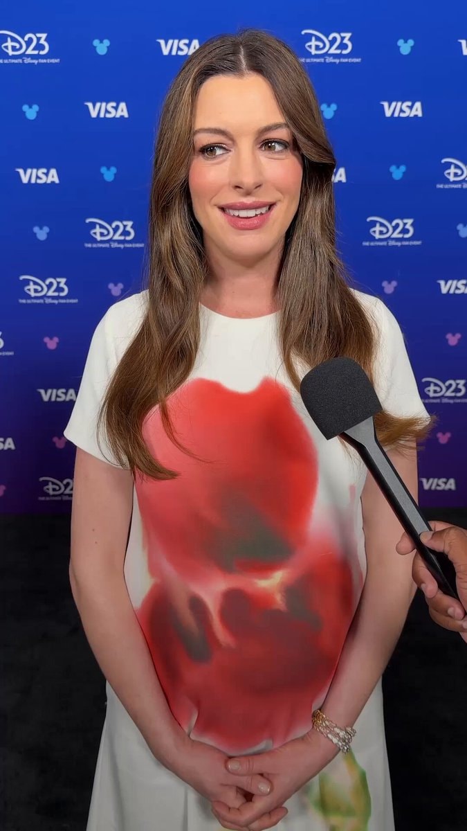 Anne Hathaway red carpet interview D23 VISA