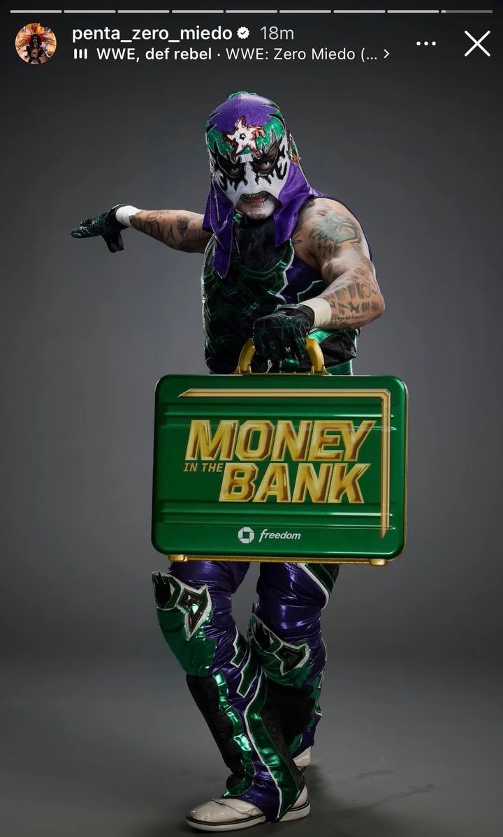 Penta with WWE Money in the Bank briefcase Penta with WWE Money in the Bank briefcase