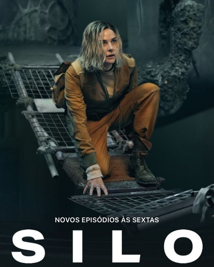 Woman in orange jumpsuit on metal grate Woman in orange jumpsuit on metal grate