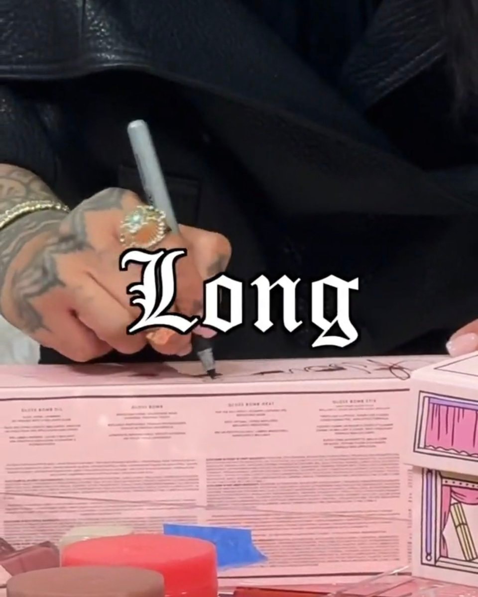 signing the pink box (photo 3 of 3)