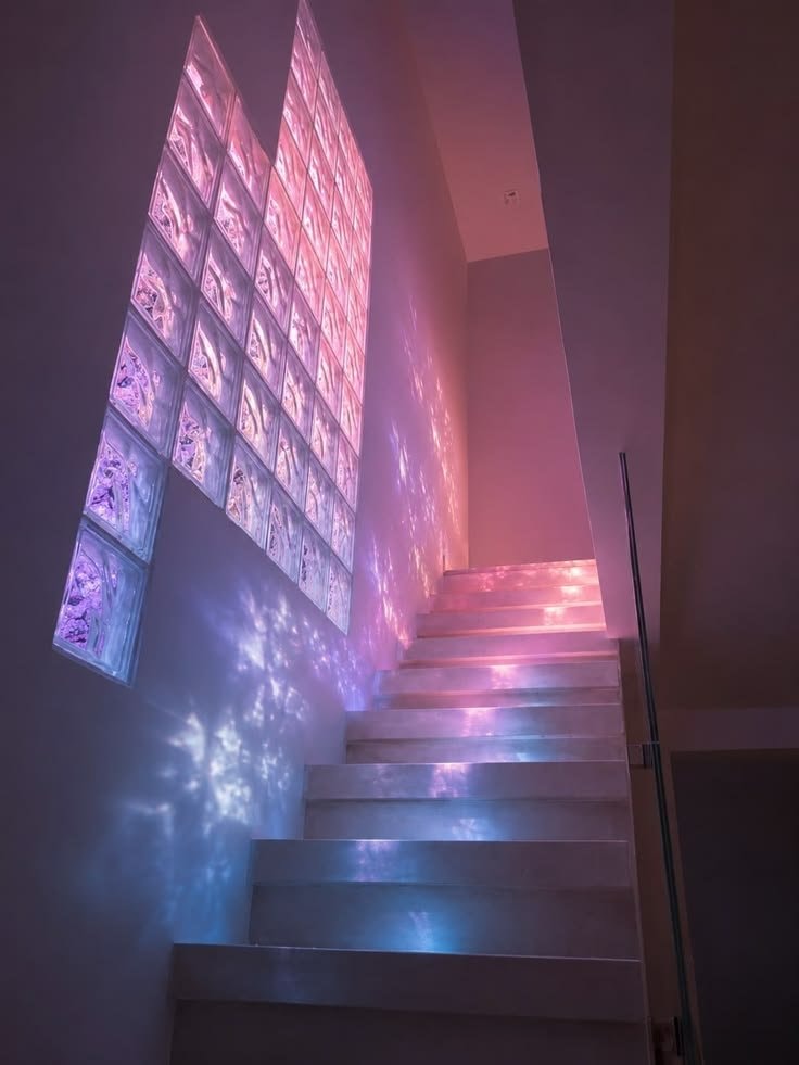 modern staircase with glass block window