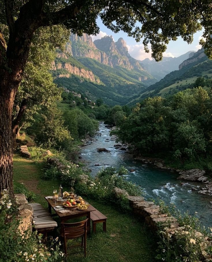 Picnic by the river with mountains