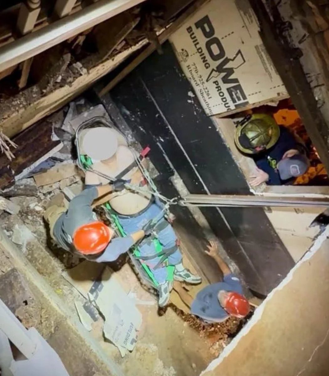 Georgia delivery worker rescued from 20-foot pit (photo 3 of 3)