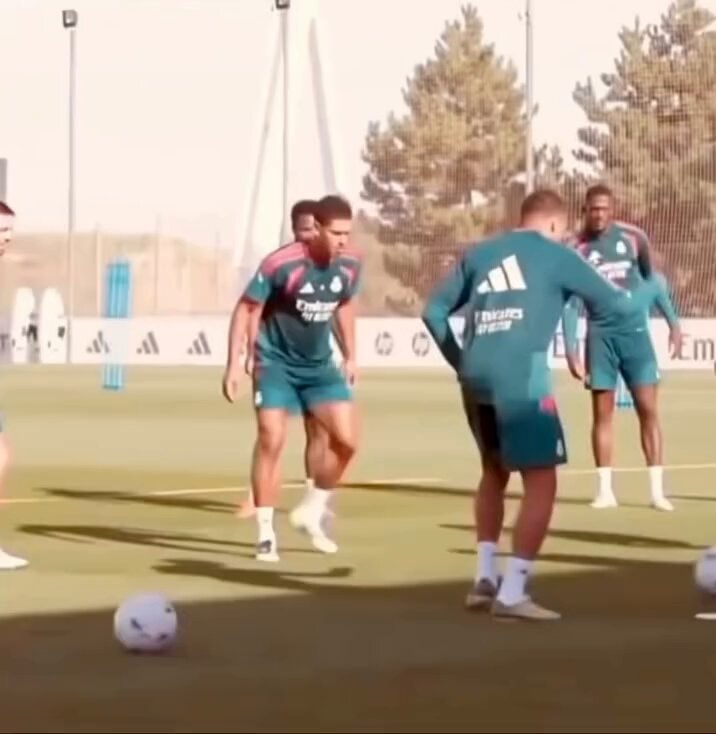 Jude Bellingham checks on Bernardo Silva
