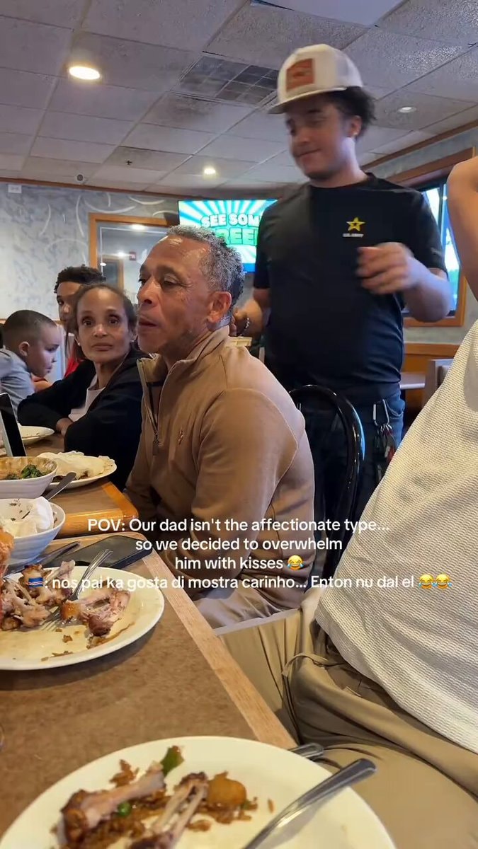 Family kisses unaffectionate dad at restaurant