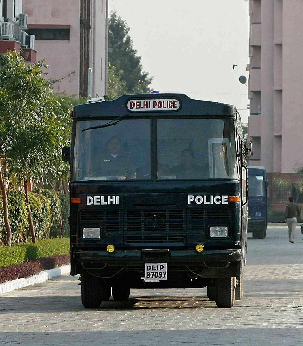 India police bus pushed after keys taken (photo 2 of 2)
