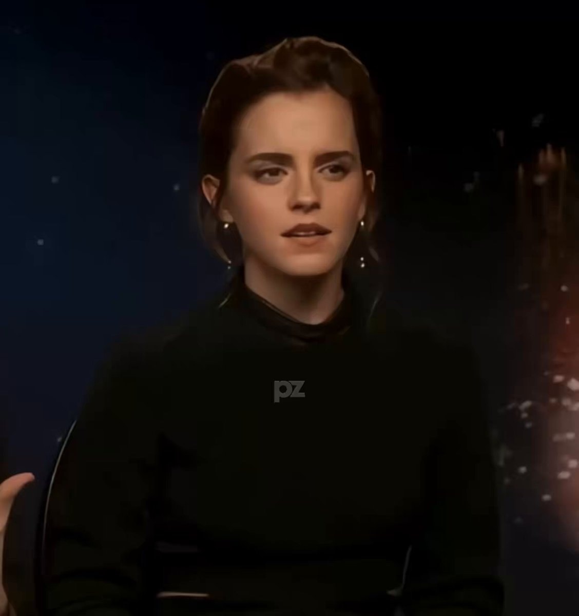 Emma Watson helps with pen ink during interview