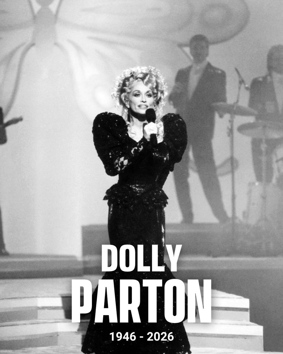Dolly Parton performing on stage (photo 2 of 2)
