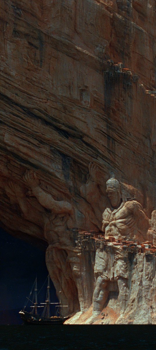 Carved stone Atlas figure (photo 3 of 4)