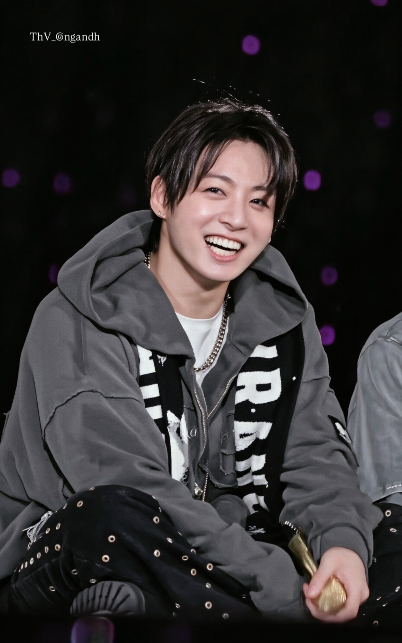 Jungkook and member laughing together (photo 3 of 4)