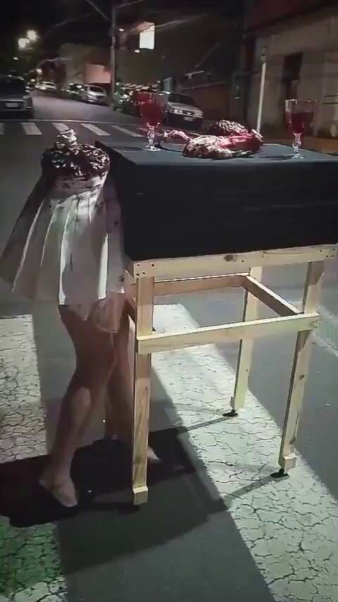 Woman in white dress table scene