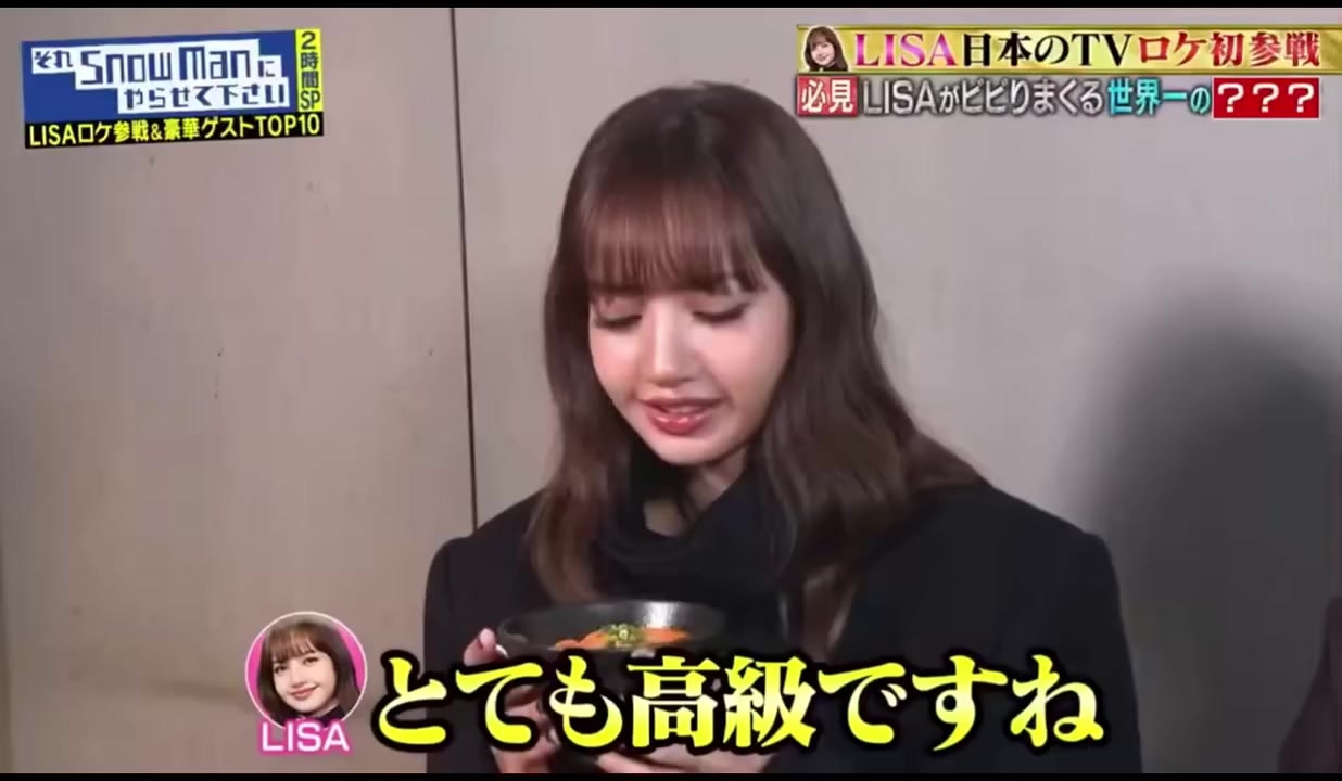 Lisa holding a bowl of food