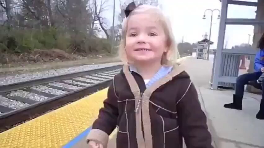 Baby girl sees train first time