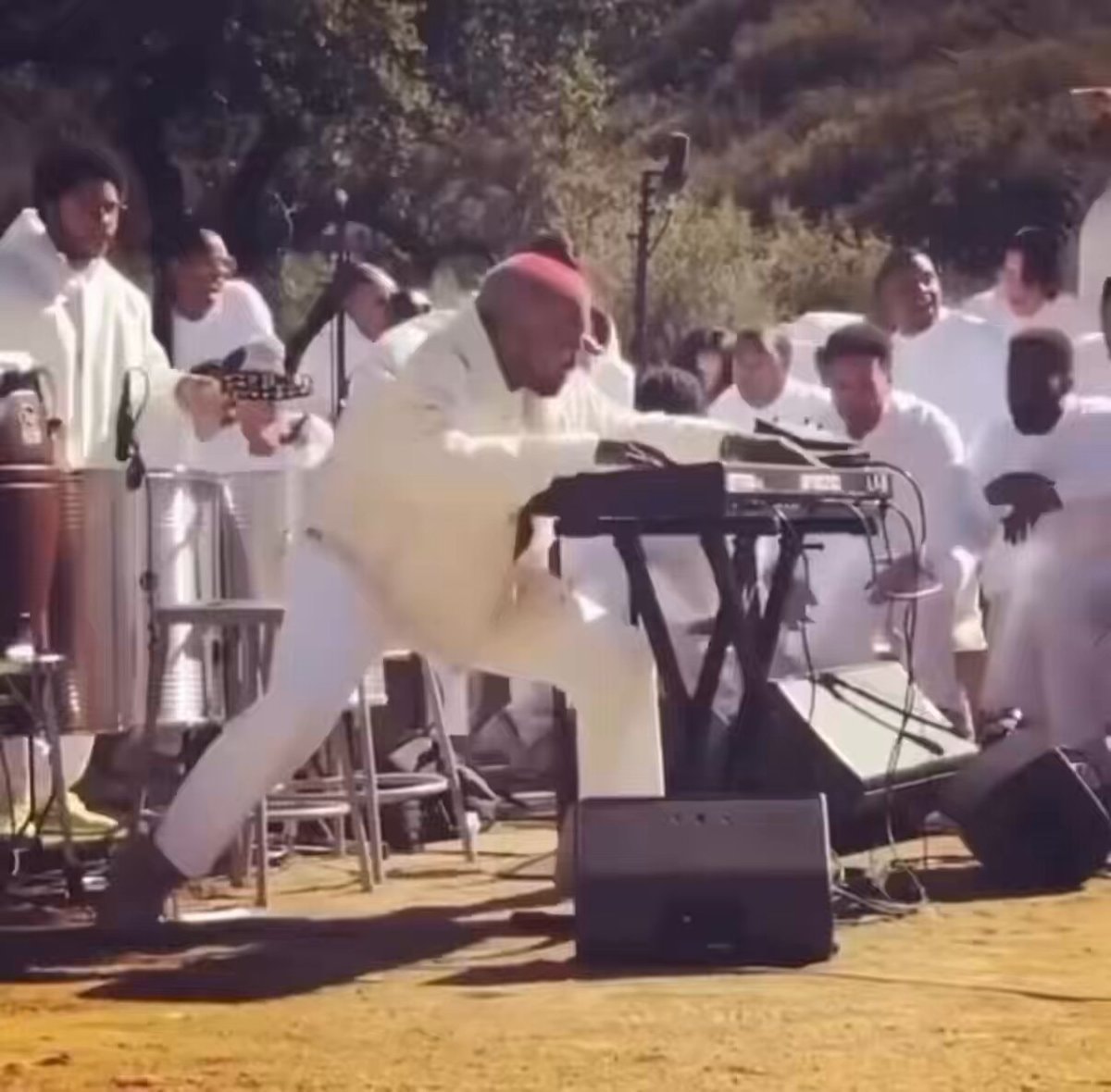 keyboard player in red cap