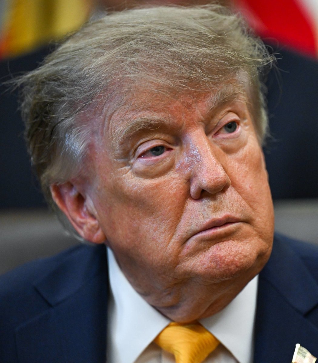 Trump new darker hairstyle