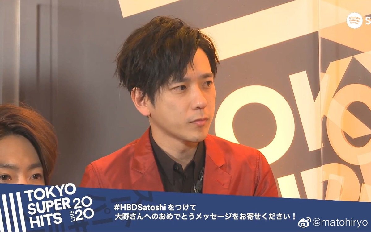 man in red velvet jacket (photo 4 of 4)