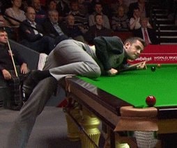 snooker player sinking dramatic shot