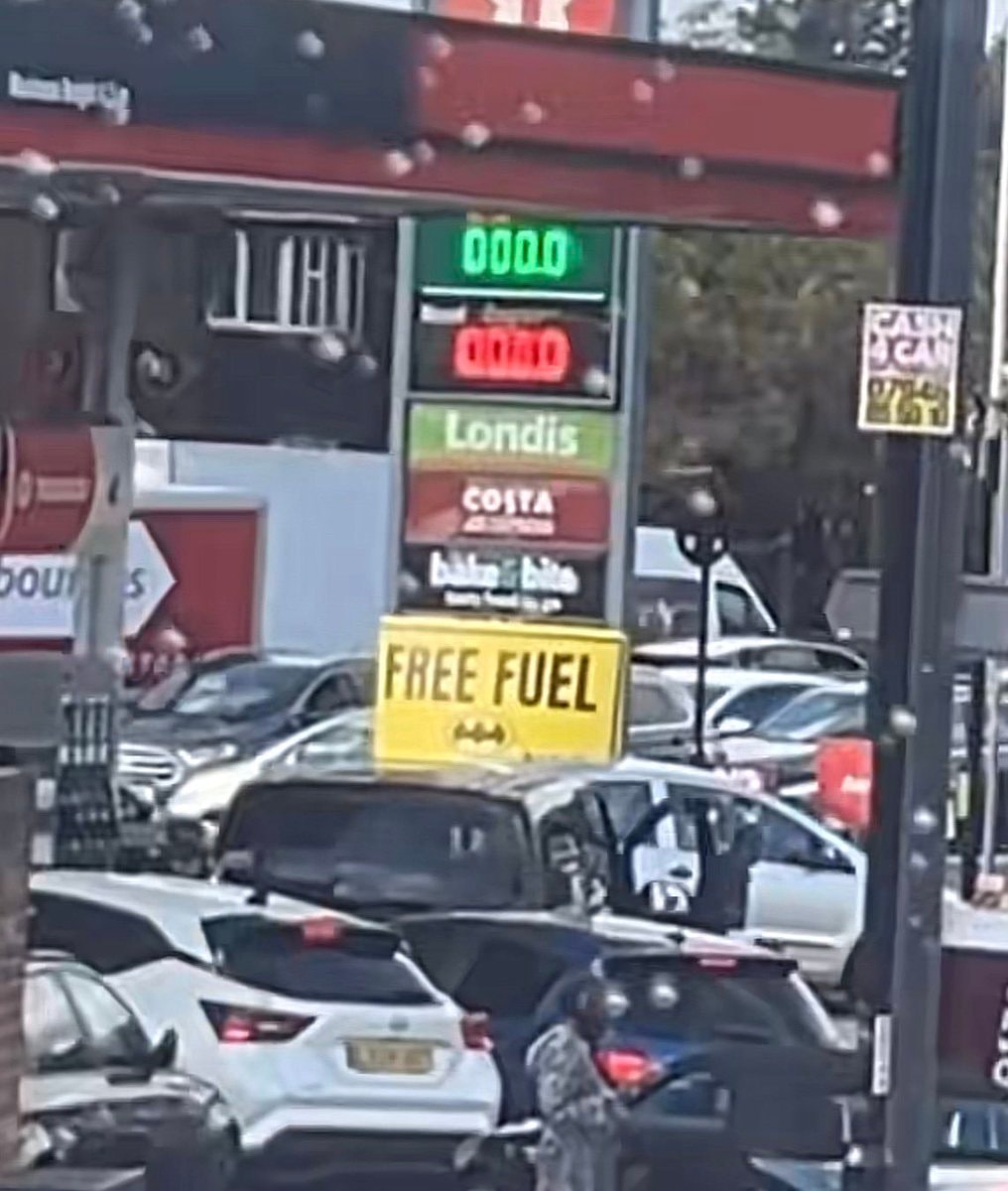 Batman gives away fuel in London (photo 2 of 2)