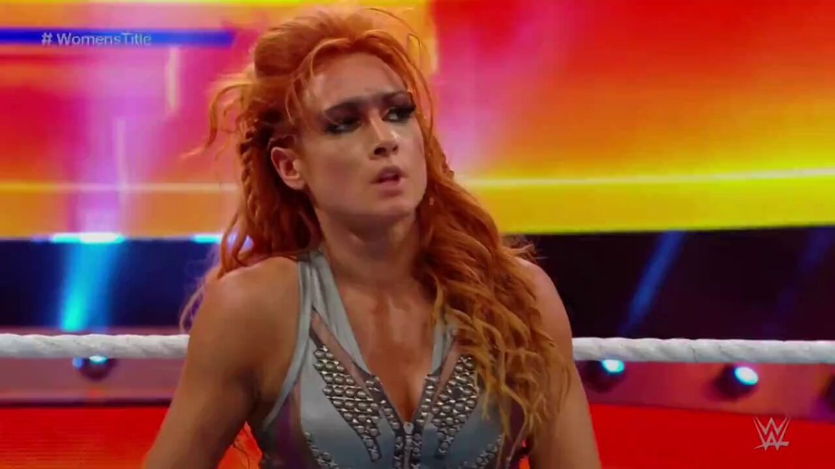 Becky Lynch attacks Charlotte Flair
