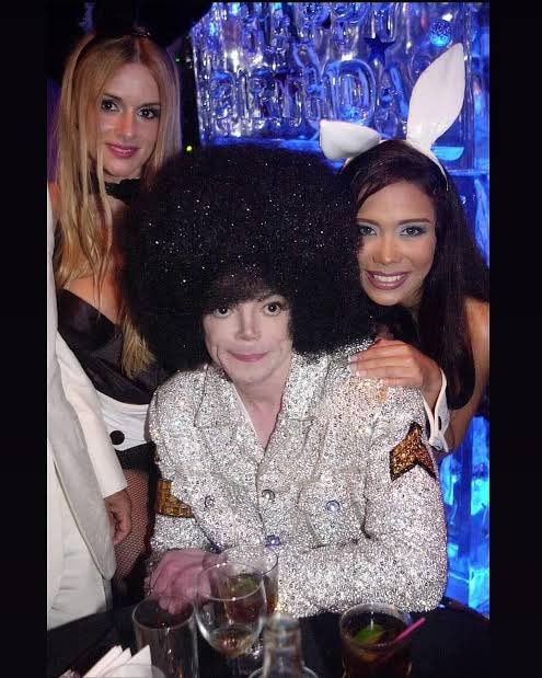 Costume group with silver jacket and bunny outfit