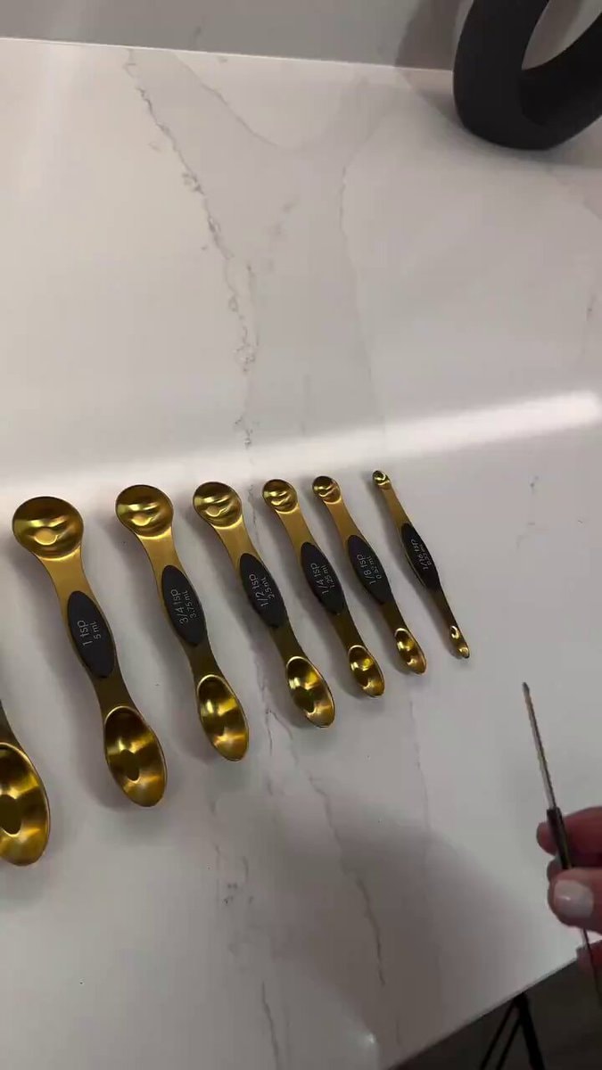 gold measuring spoons