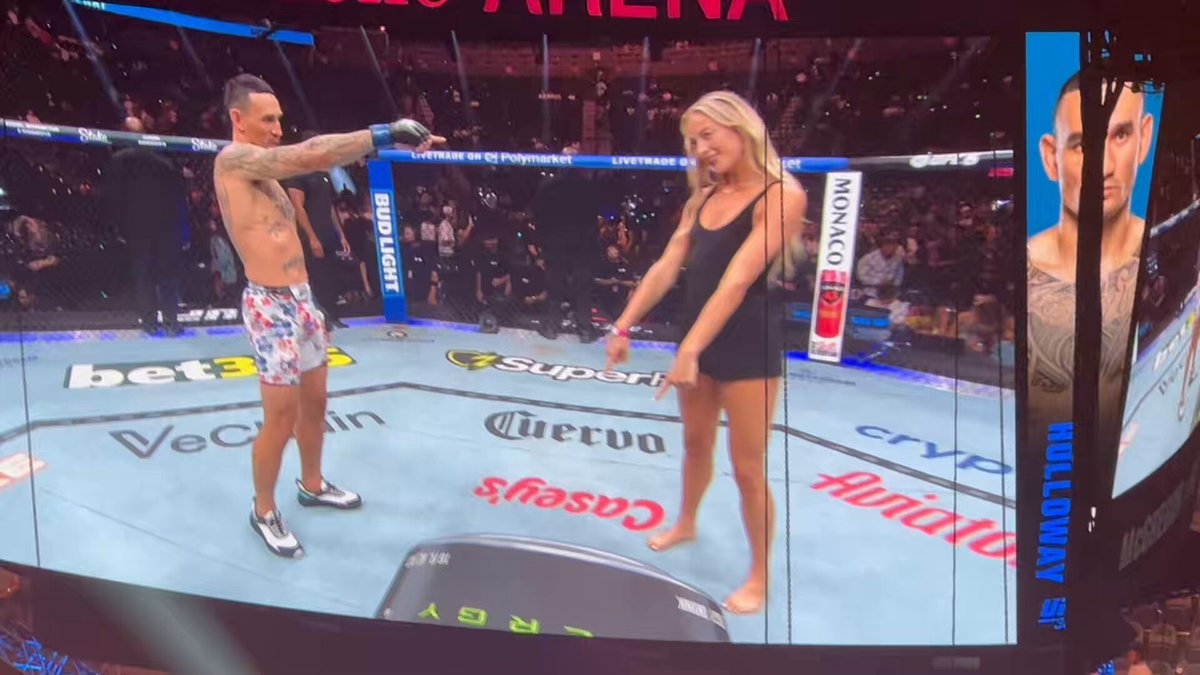 Holloway and Cunningham pointing meme UFC 329