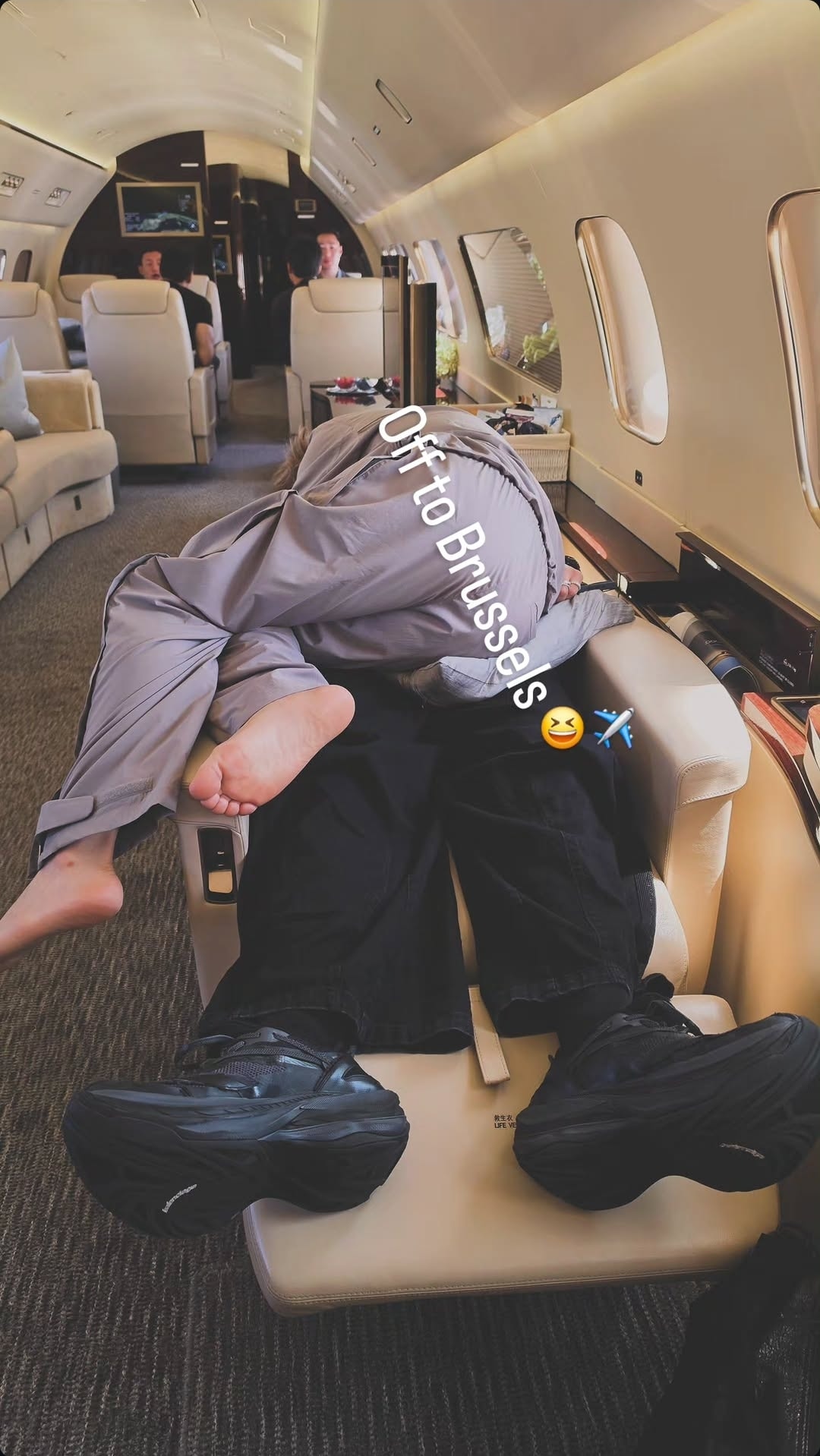 Jimin Jungkook asleep on private jet (photo 2 of 2)