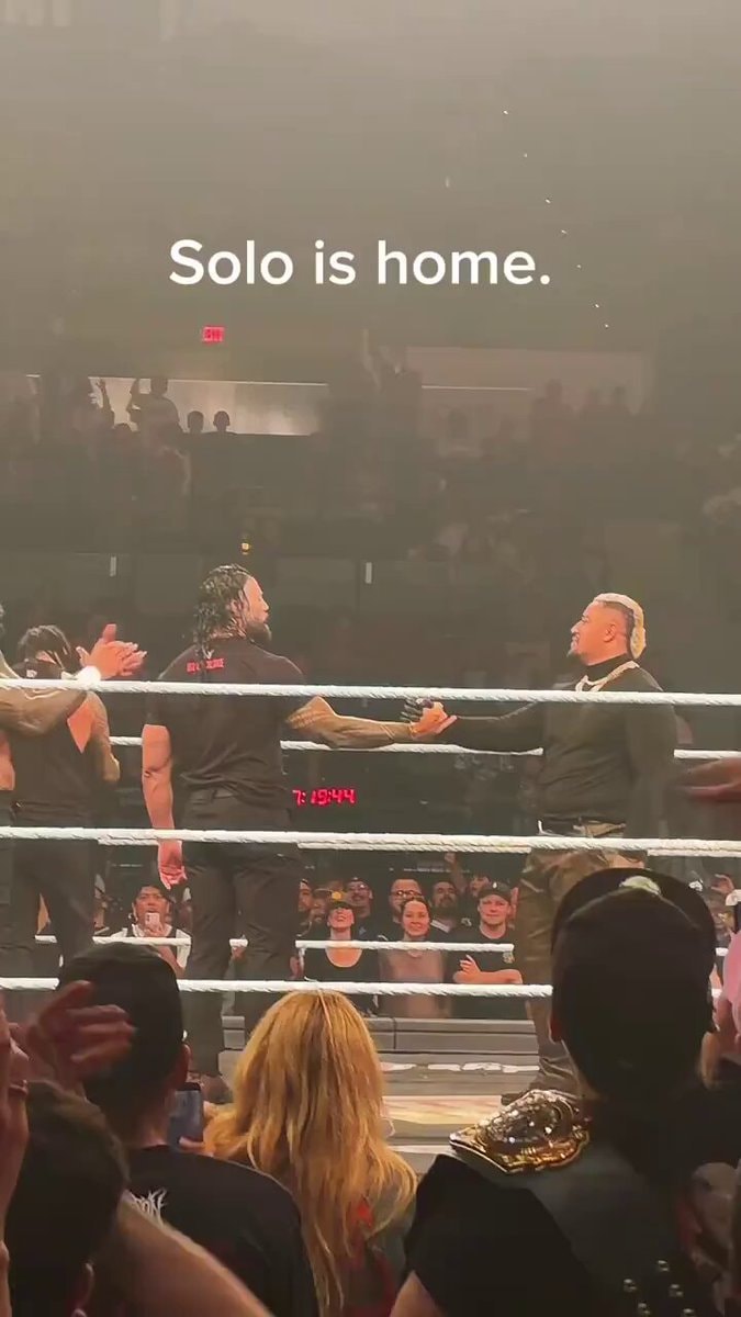 Roman Reigns Solo Sikoa embrace