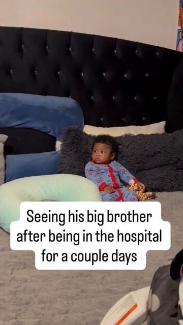 Baby sees brother after hospital stay