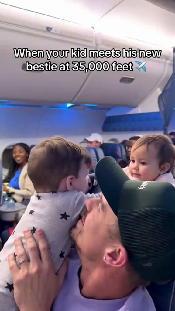Babies meeting on airplane