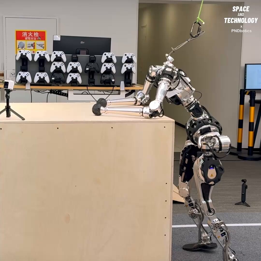 Adam robot climbs one meter box