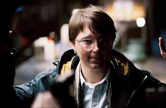 man in glasses peace sign