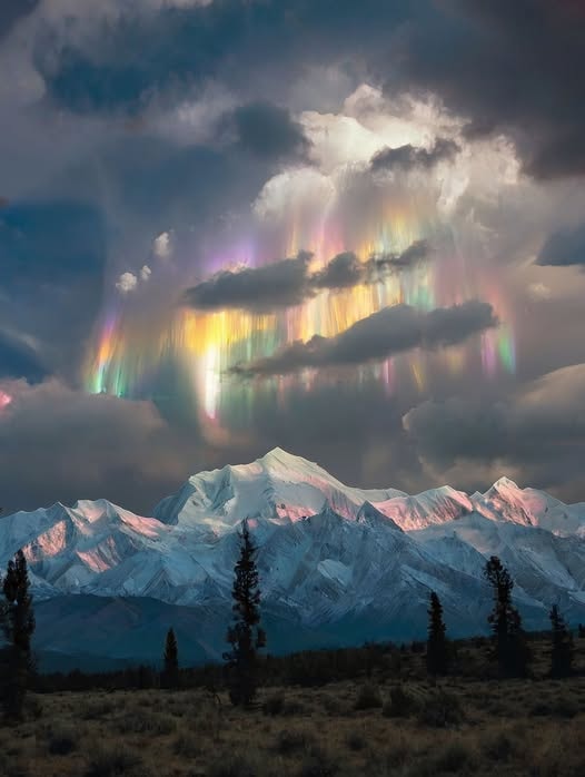 Rainbow storm over Denali Alaska aurora