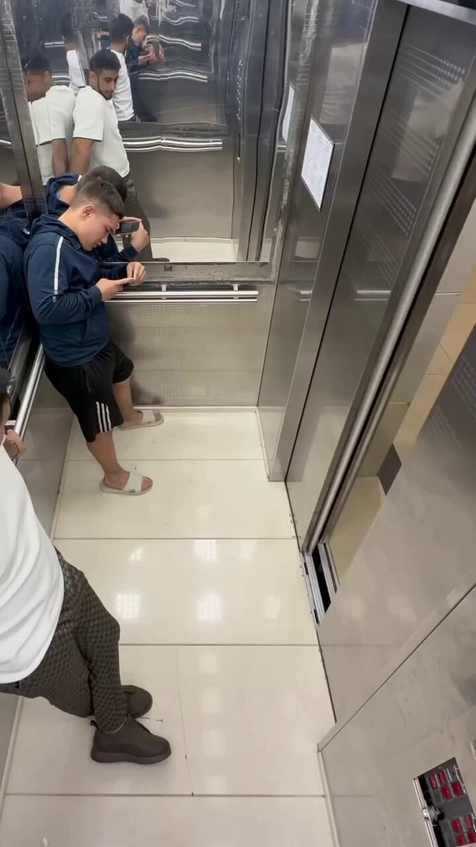 Mirrored elevator phone crew