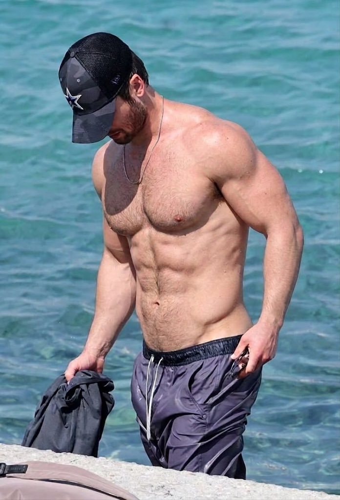 Glen Powell vacation abs (photo 2 of 2)
