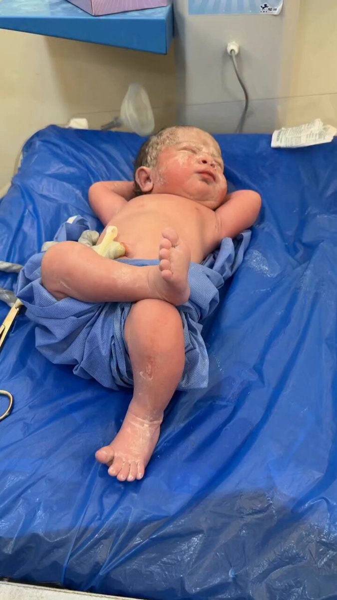 Newborn baby calm and peaceful after birth