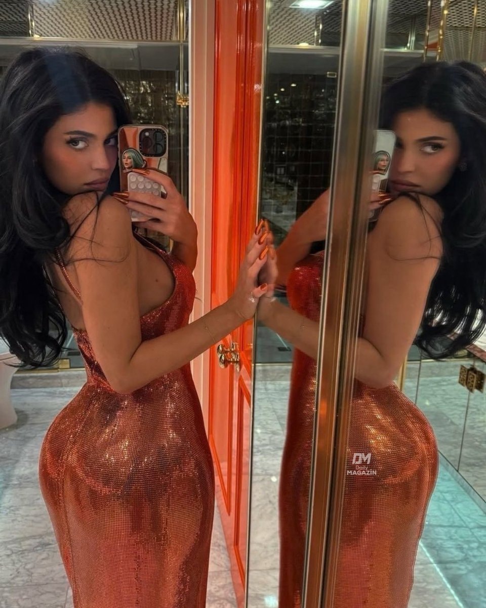 Kylie Jenner in orange dress