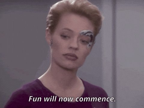 Woman with eye markings reaction GIF