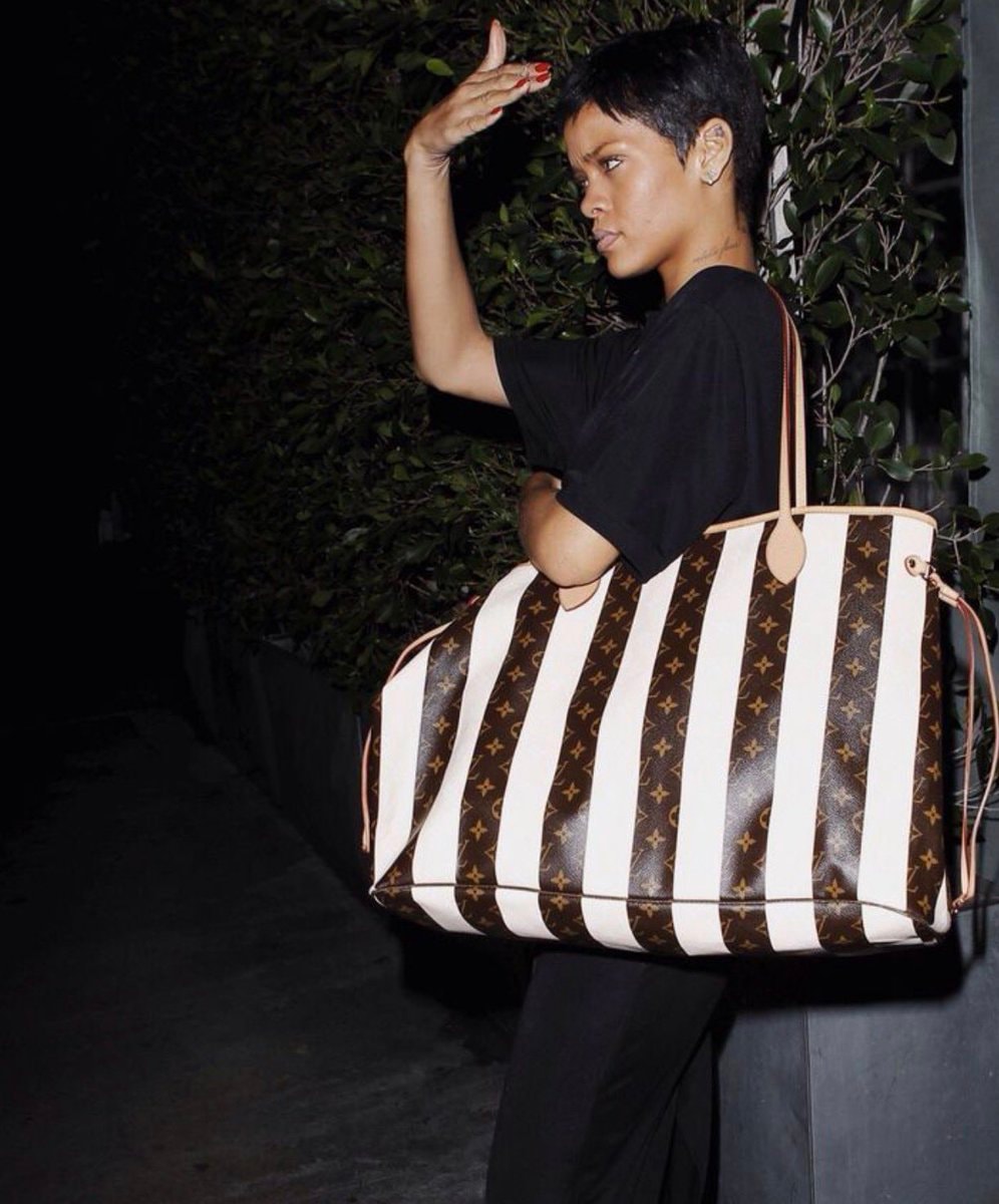 Rihanna hiding in a bag